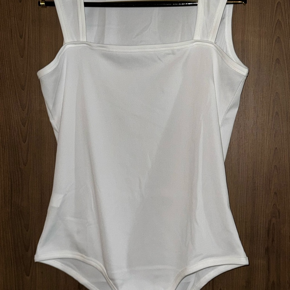 Women's Ribbed Bodysuit In White. New